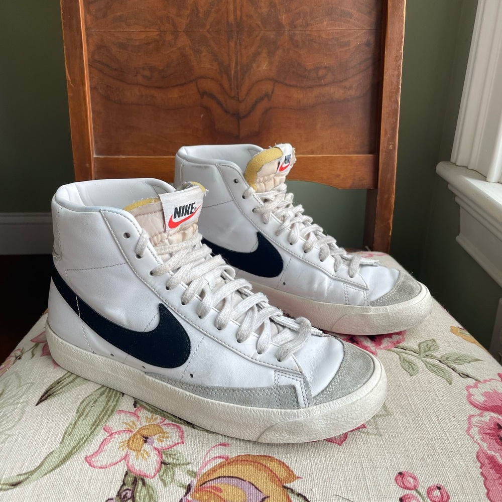 Nike White High-Top Sneakers with Black Swoosh